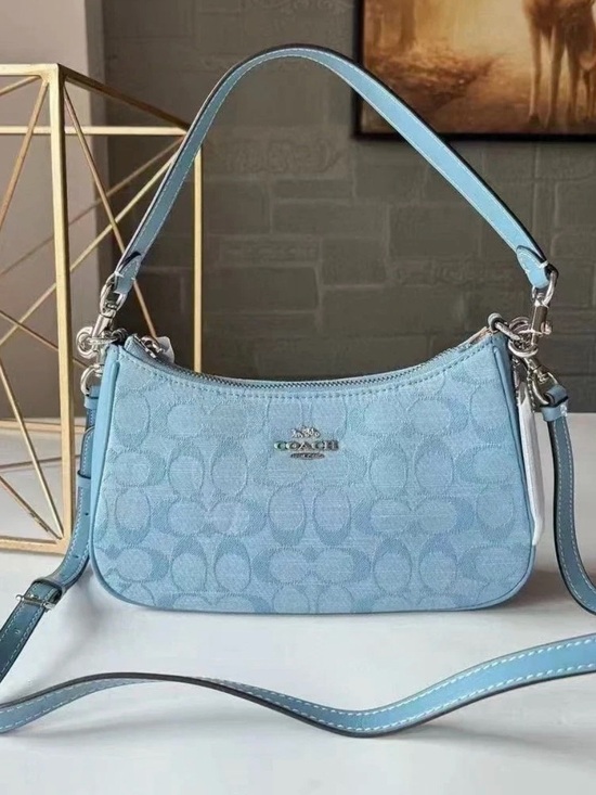 Coach Handbags - Coach Light Blue Signature Canvas Crossbody Bag